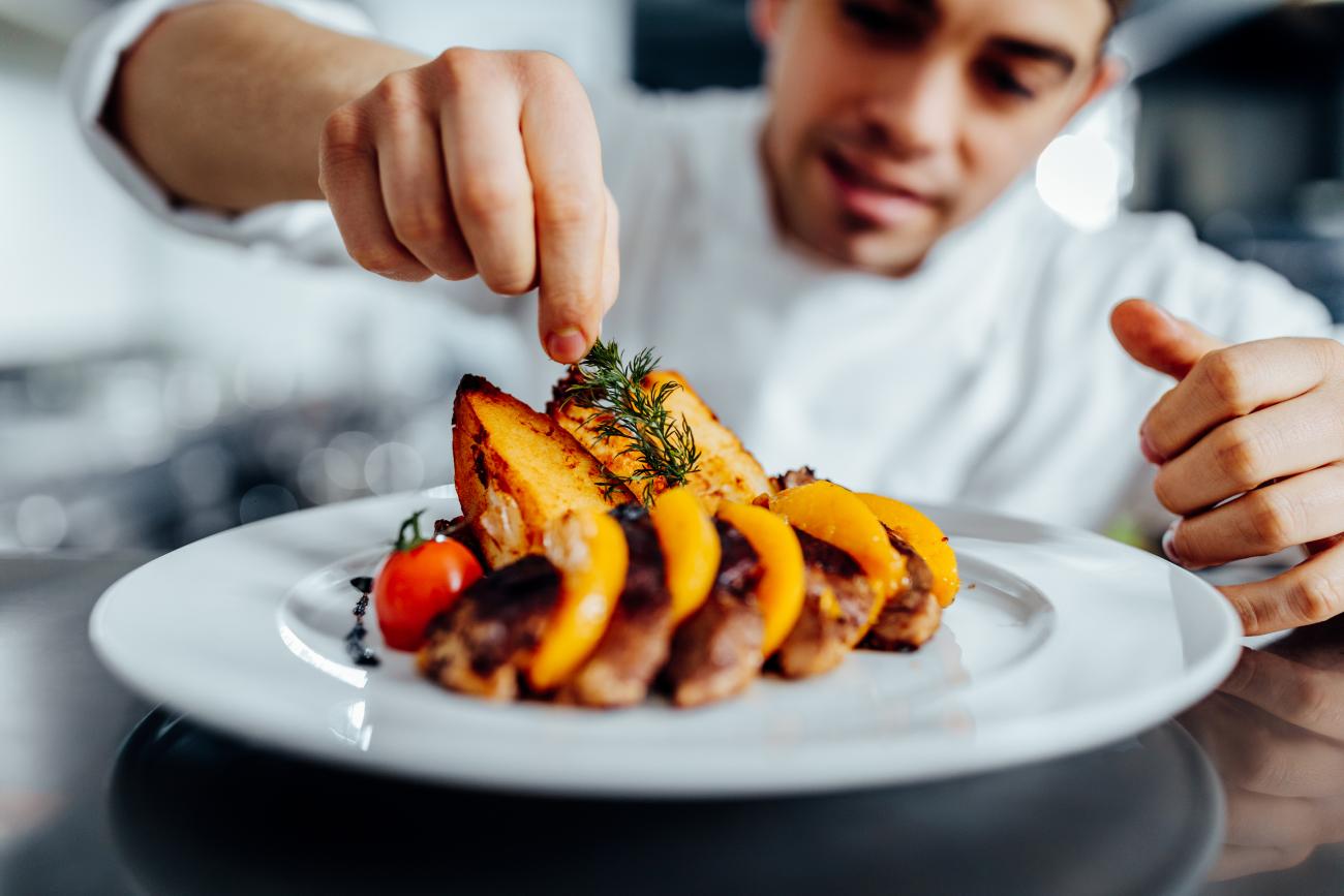 Chef plating a dish