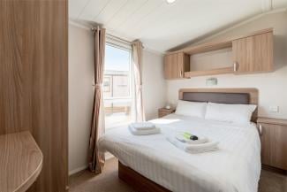 Castaway holiday home master bedroom