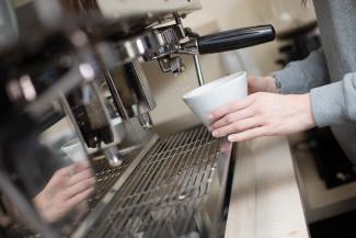 Barista making coffee at The Mirador Cafe