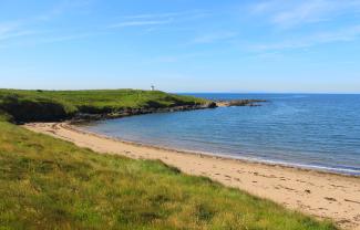 Deserted beach at Ruby Bay